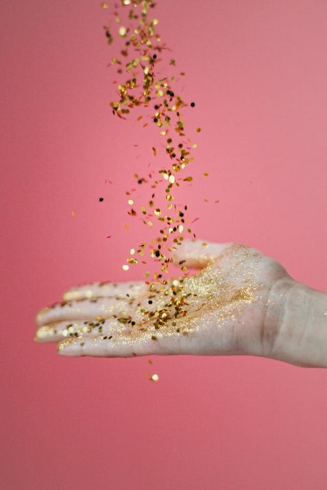 Photo by cottonbro studio: https://www.pexels.com/photo/person-catching-glitters-3401907/